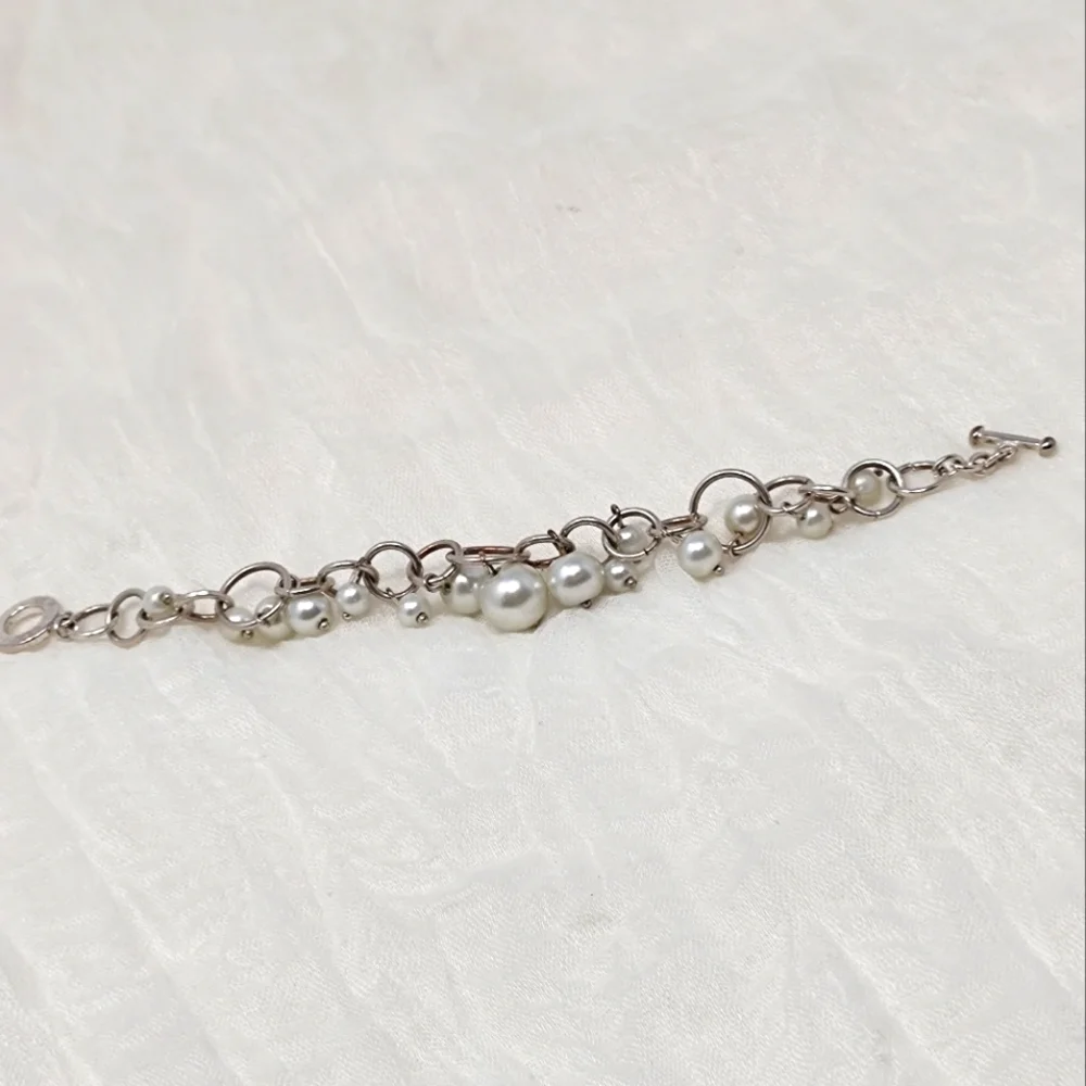Faux silvery pearl bauble bead silver tone chain link bracelet with toggle clasp